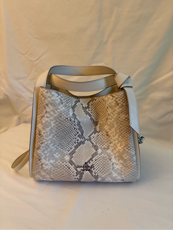 kate spade Handbags - Kate Spade Cream Snake-Embossed Knott Crossbody Purse